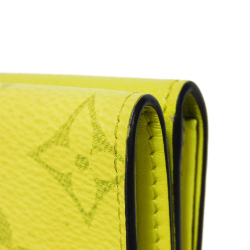 LOUIS VUITTON Tri-fold wallet M67629 Taiga leather x monogram canvas x smooth leather Jonne LV Logo Flower Yellow Taiga Lama Monogram Discovery compact wallet mens Used Authentic