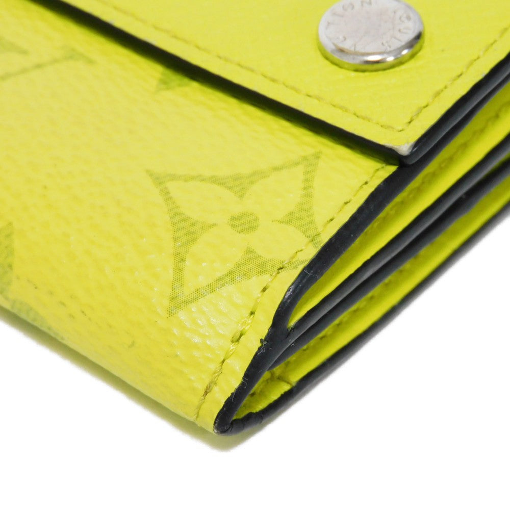 LOUIS VUITTON Tri-fold wallet M67629 Taiga leather x monogram canvas x smooth leather Jonne LV Logo Flower Yellow Taiga Lama Monogram Discovery compact wallet mens Used Authentic