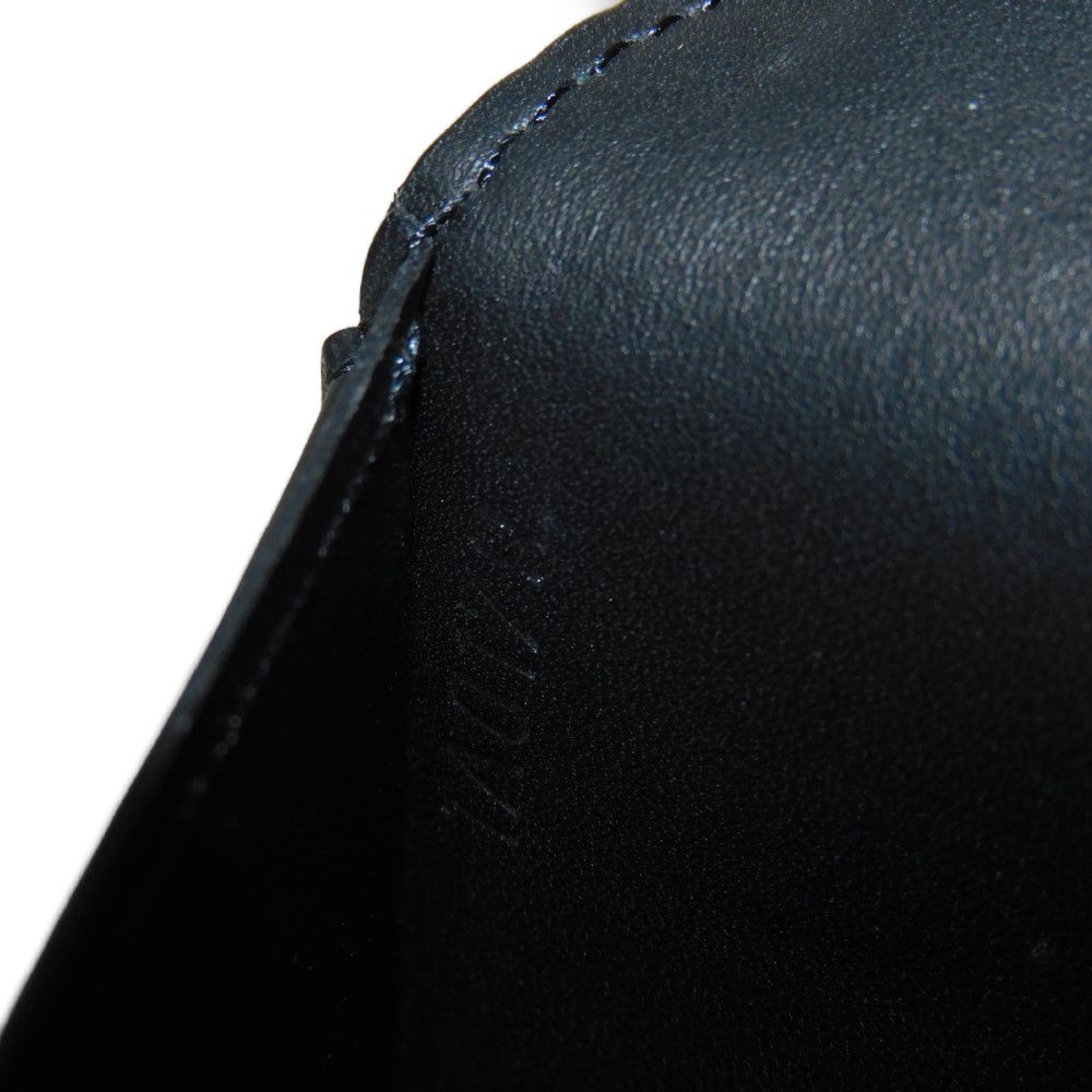 LOUIS VUITTON Long Wallet Purse M62900 Shadow leather (monogram embossing) Noir LV Logo Flower Embossed Black Bifold Wallet Monogram shadow Portefeuille Braza mens Used Authentic