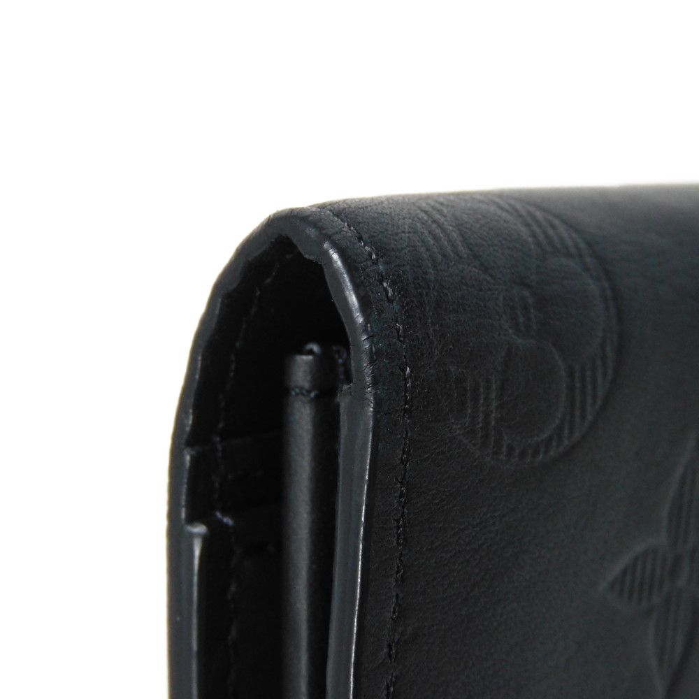 LOUIS VUITTON Long Wallet Purse M62900 Shadow leather (monogram embossing) Noir LV Logo Flower Embossed Black Bifold Wallet Monogram shadow Portefeuille Braza mens Used Authentic