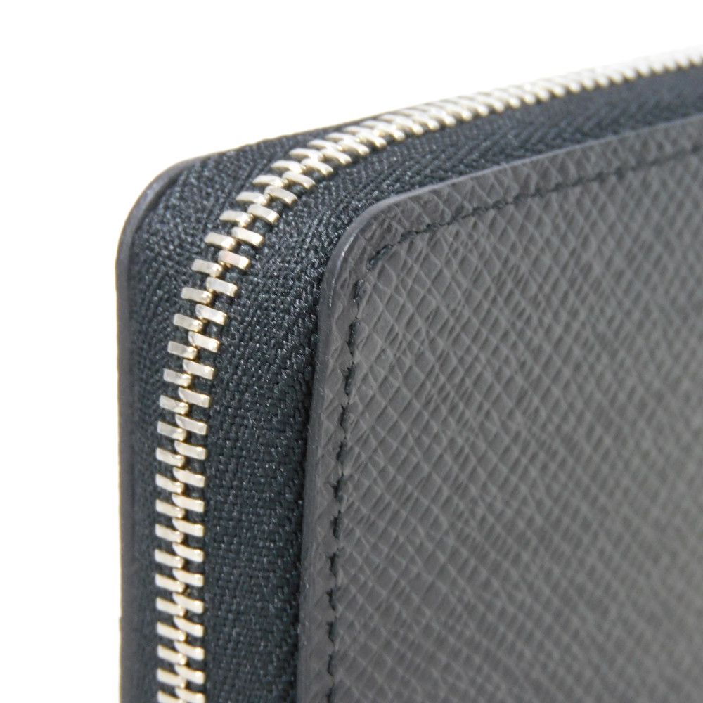 LOUIS VUITTON Coin case M30511 Taiga leather (embossed) Noir New LV logo embossed black Zip Around Taiga Zippy coin purse mens Used Authentic