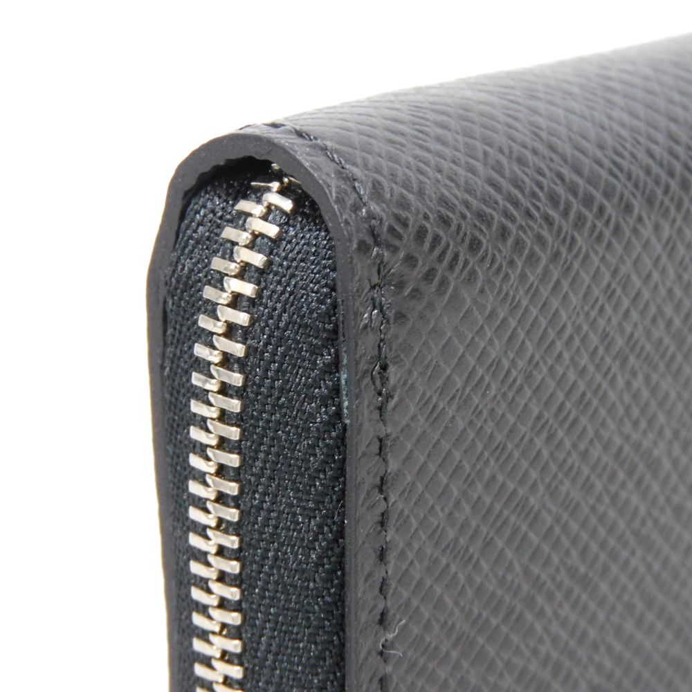LOUIS VUITTON Coin case M30511 Taiga leather (embossed) Noir New LV logo embossed black Zip Around Taiga Zippy coin purse mens Used Authentic