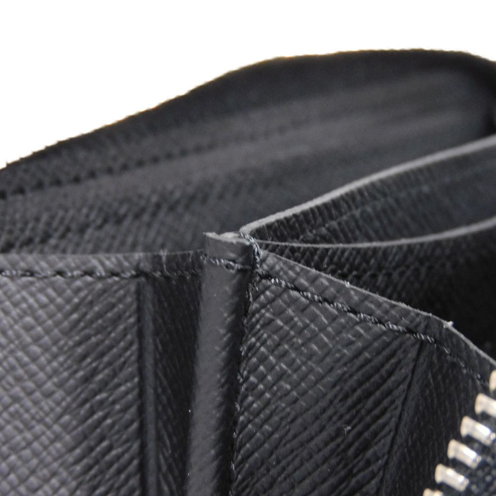 LOUIS VUITTON Coin case M30511 Taiga leather (embossed) Noir New LV logo embossed black Zip Around Taiga Zippy coin purse mens Used Authentic