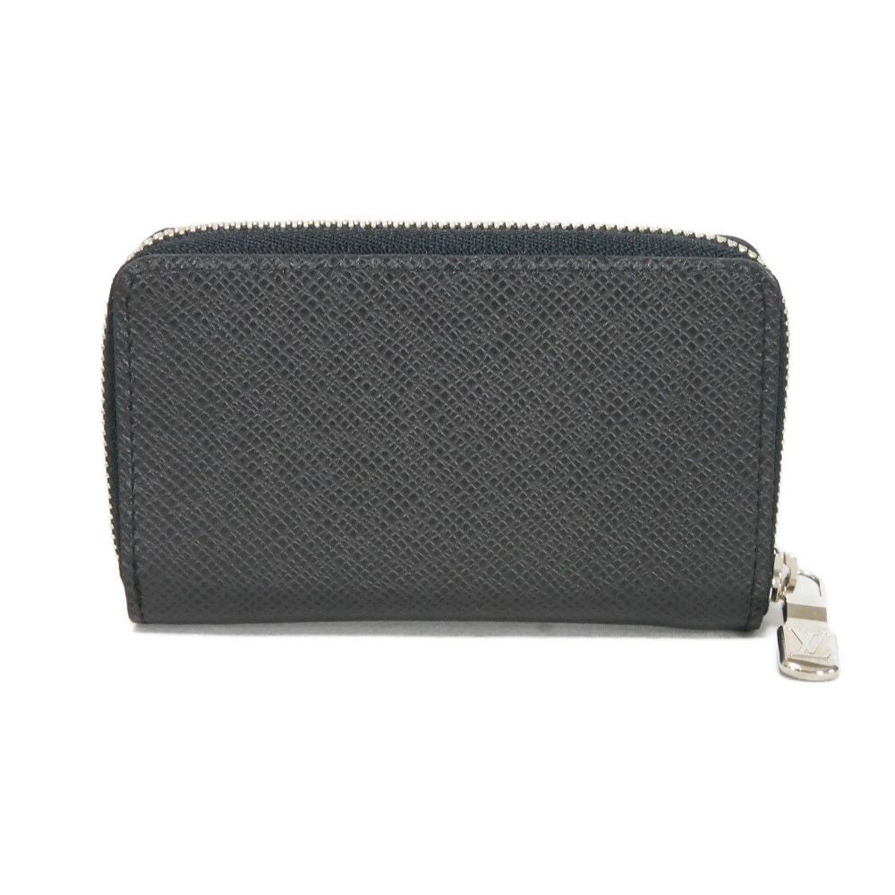 LOUIS VUITTON Coin case M30511 Taiga leather (embossed) Noir New LV logo embossed black Zip Around Taiga Zippy coin purse mens Used Authentic
