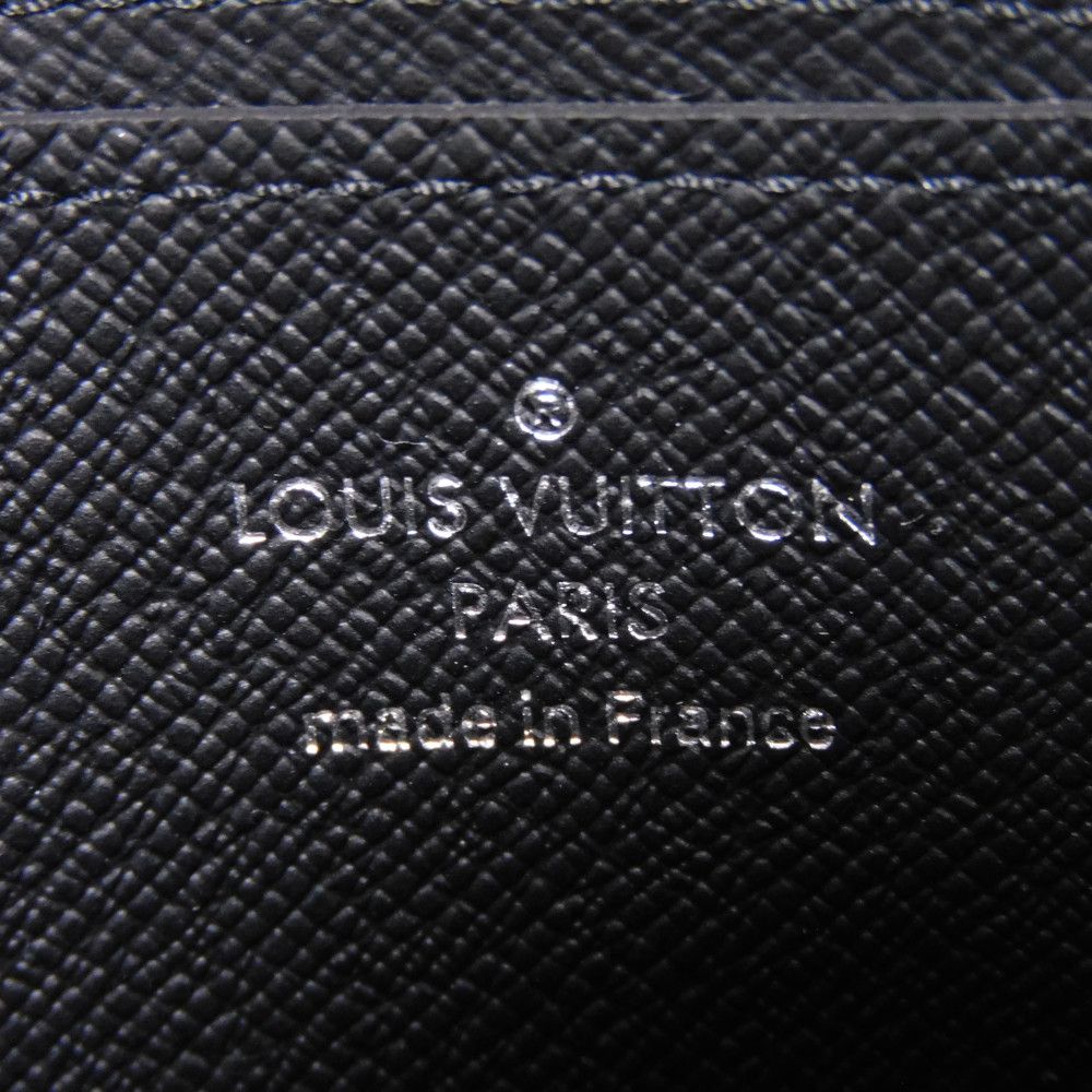 LOUIS VUITTON Coin case M30511 Taiga leather (embossed) Noir New LV logo embossed black Zip Around Taiga Zippy coin purse mens Used Authentic