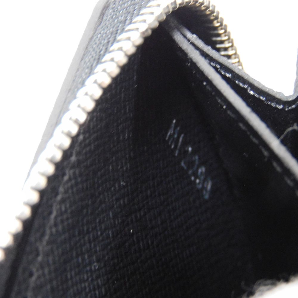 LOUIS VUITTON Coin case M30511 Taiga leather (embossed) Noir New LV logo embossed black Zip Around Taiga Zippy coin purse mens Used Authentic
