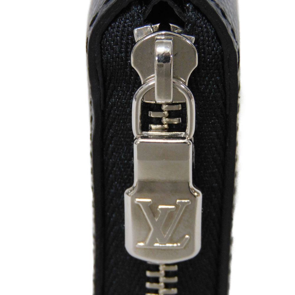 LOUIS VUITTON Coin case M30511 Taiga leather (embossed) Noir New LV logo embossed black Zip Around Taiga Zippy coin purse mens Used Authentic