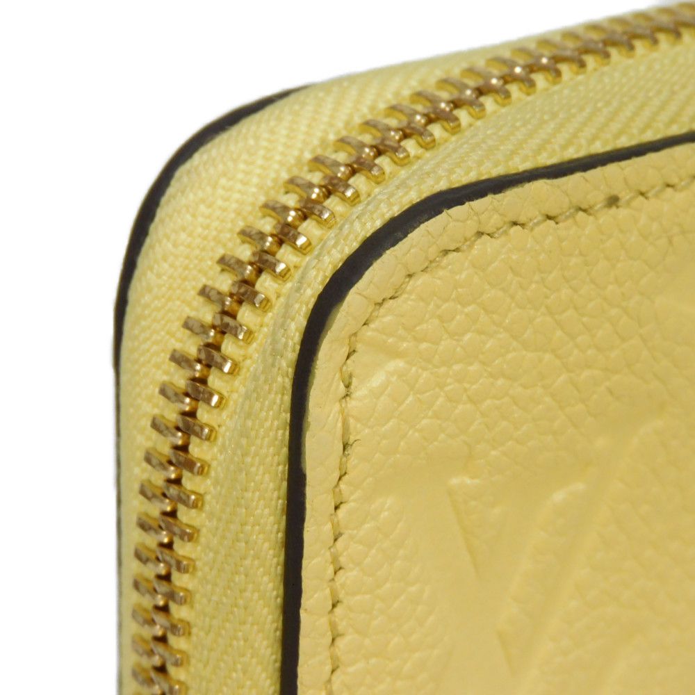 LOUIS VUITTON Long Wallet Purse M82043 Implant leather (monogram embossed) yellow Monogram Unplant Zippy wallet