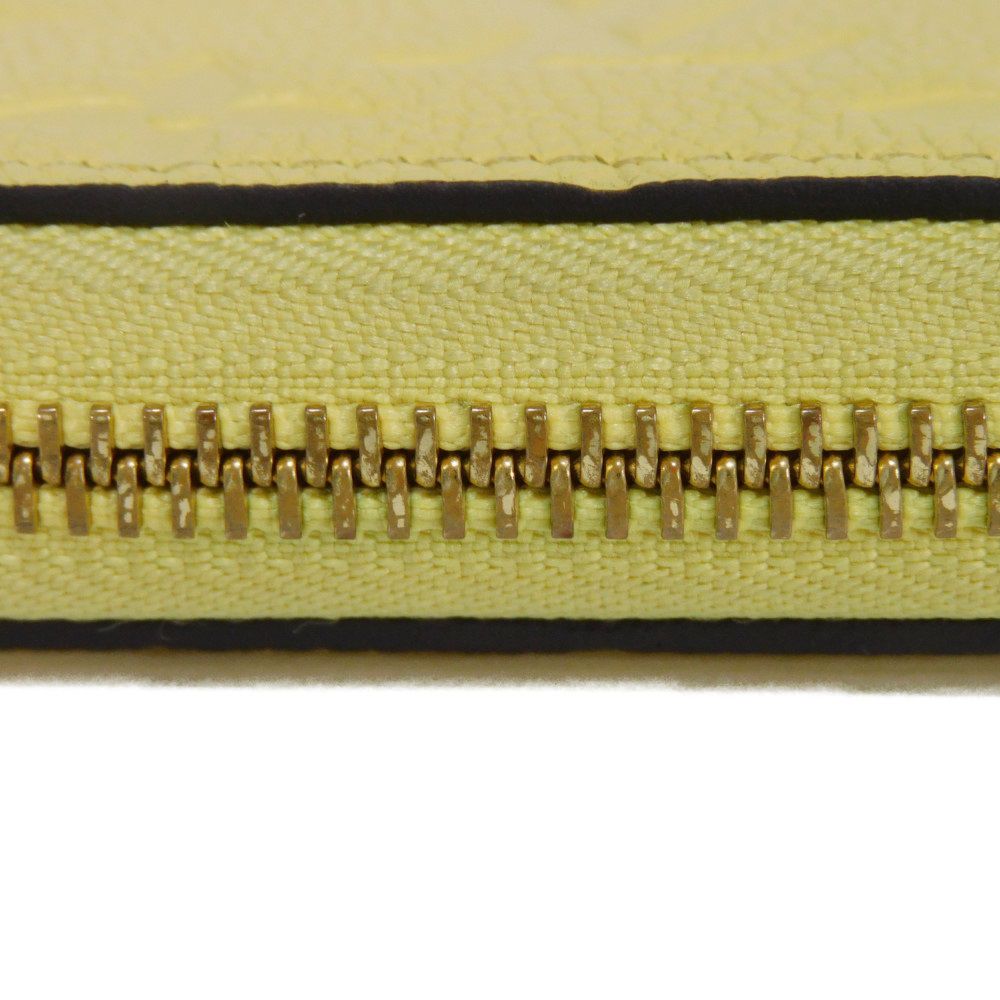 LOUIS VUITTON Long Wallet Purse M82043 Implant leather (monogram embossed) yellow Monogram Unplant Zippy wallet