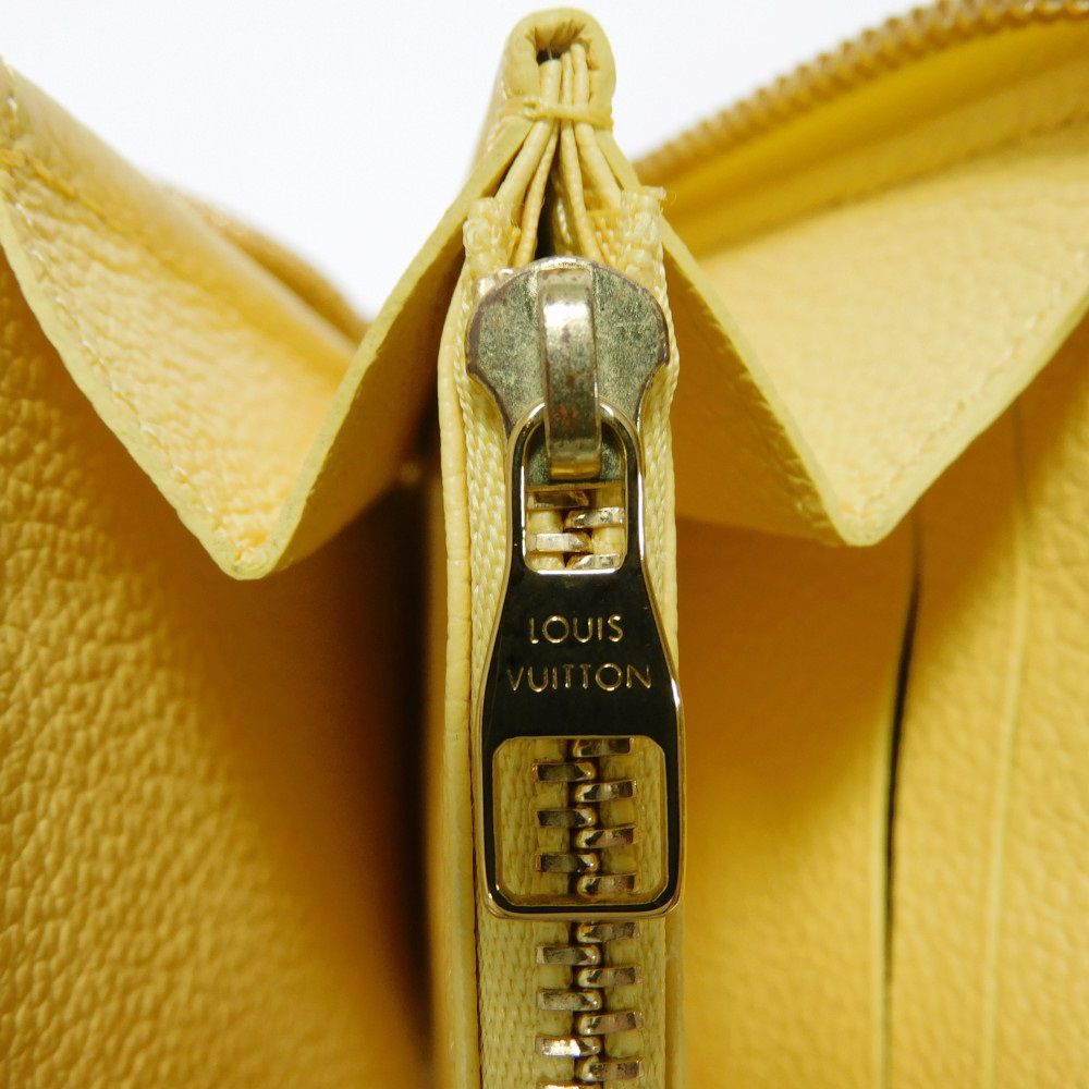 LOUIS VUITTON Long Wallet Purse M82043 Implant leather (monogram embossed) yellow Monogram Unplant Zippy wallet