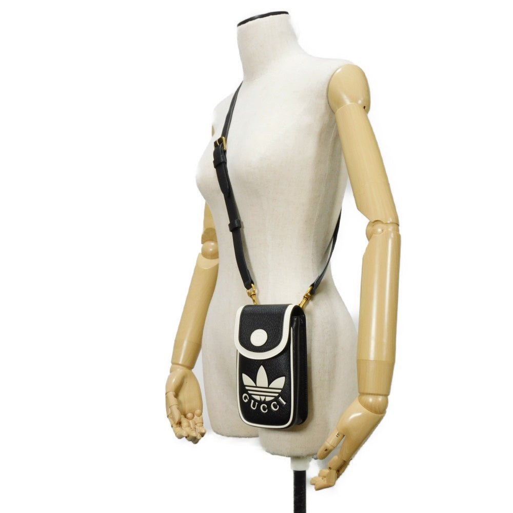 GUCCI Shoulder Bag 721794 AAA8K 8495 Textured leather black Trefoil logo white in good condition Interlocking G Adidas Phone Holder mens Used Authentic