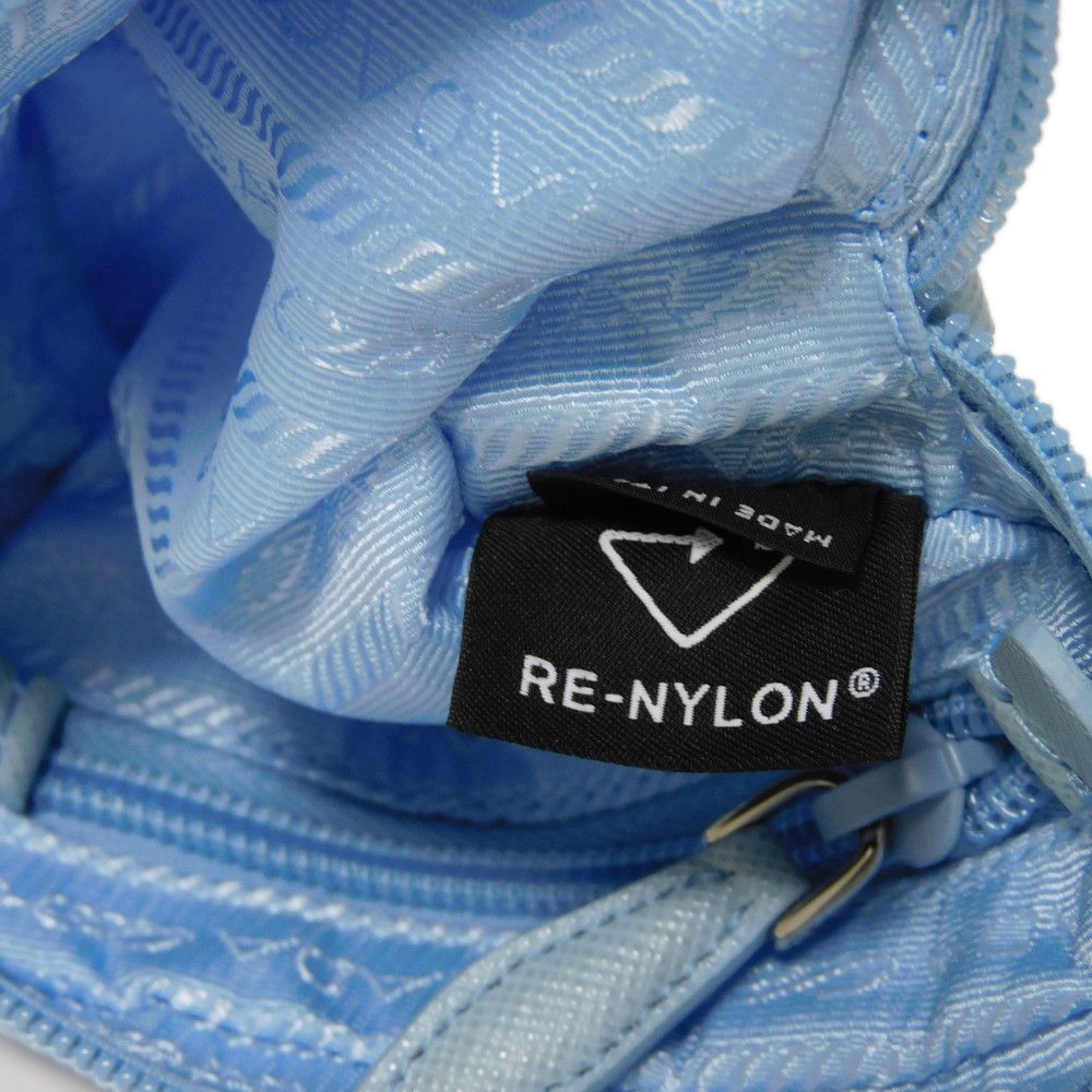 PRADA Clutch bag 1ND339 R067 F0076 recycled polyamide Light blue Current nylon pastel RFID in good condition Triangle logo Micro Re-Nylon Pouch unisex(Unisex) Used Authentic
