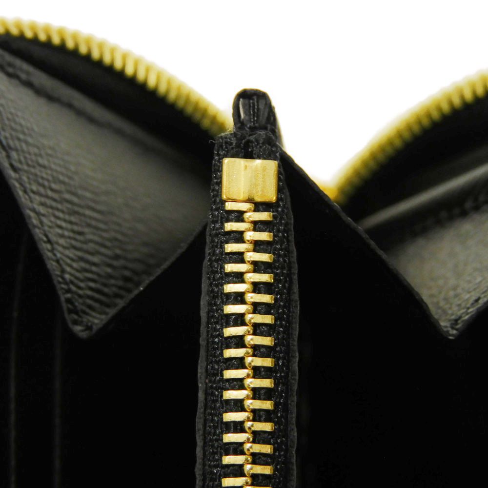 LOUIS VUITTON Long Wallet Purse M69436 Monogram Giant canvas and grained leather Creme rouge Monogram Giant LV Clafoutis Zippy wallet 238 dial