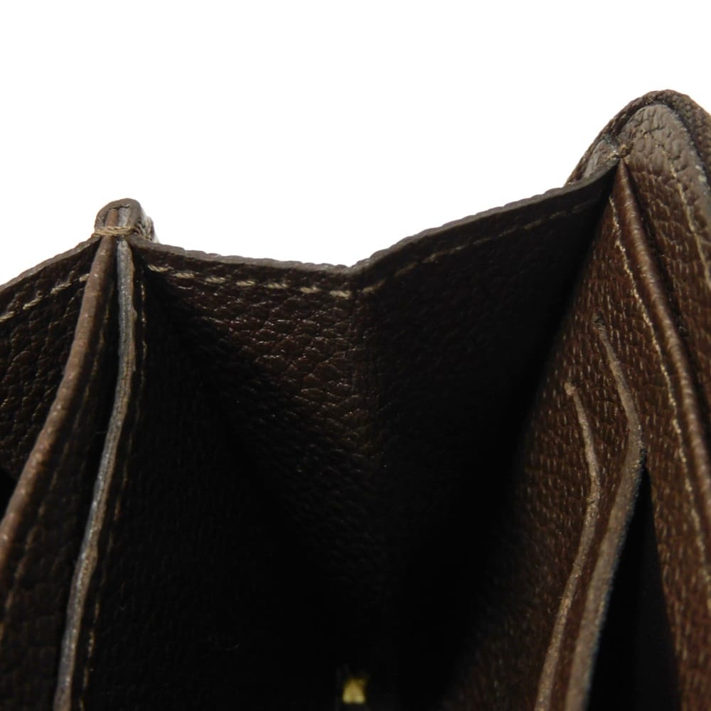 LOUIS VUITTON Coin case M60553 Implant leather (monogram embossed) Tail Monogram Unplant Zip around purse