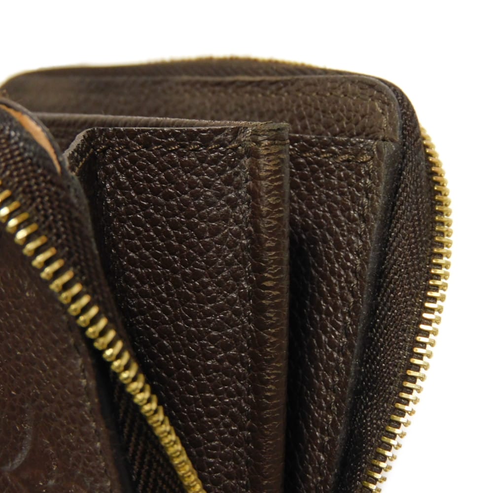 LOUIS VUITTON Coin case M60553 Implant leather (monogram embossed) Tail Monogram Unplant Zip around purse