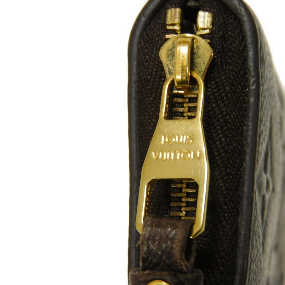 LOUIS VUITTON Coin case M60553 Implant leather (monogram embossed) Tail Monogram Unplant Zip around purse