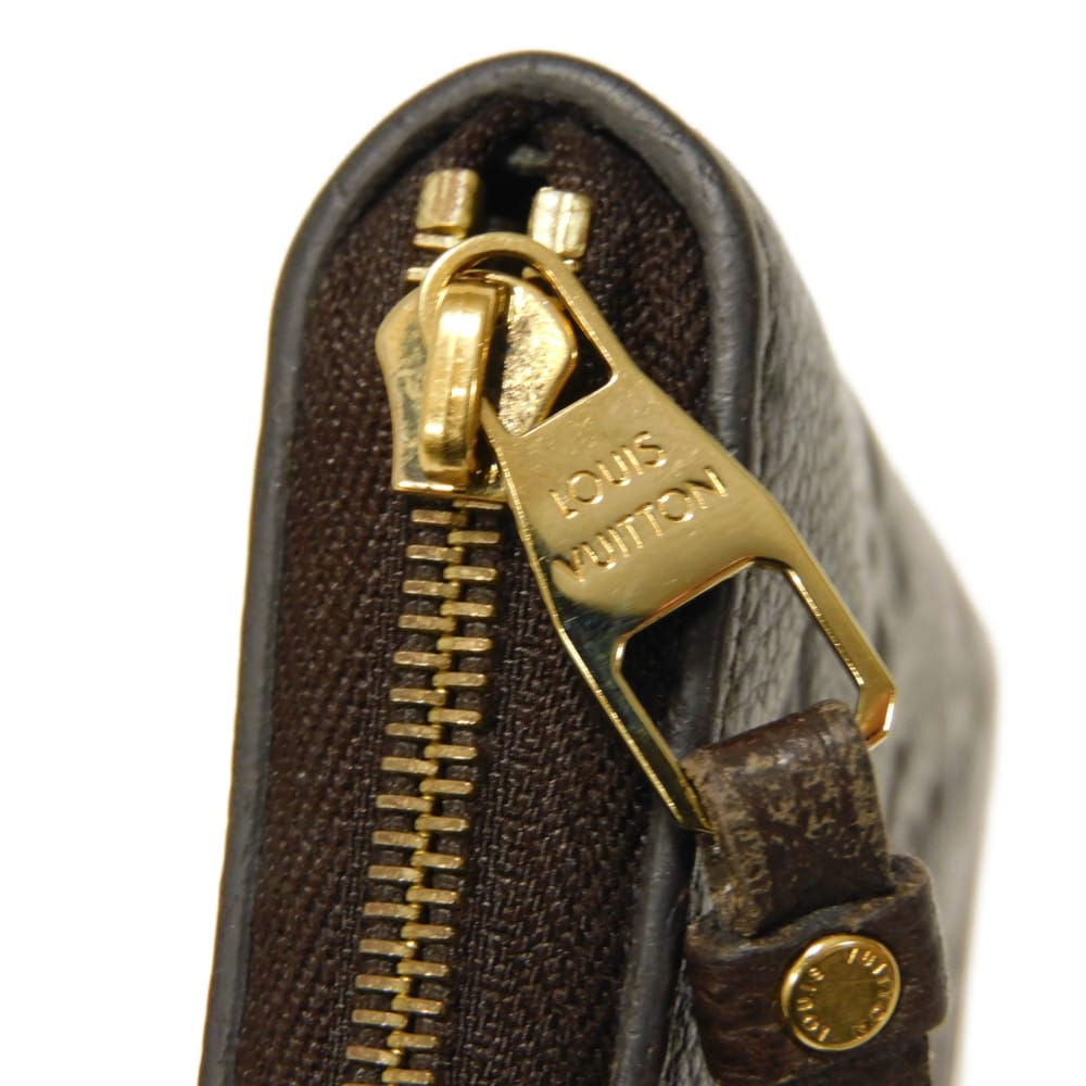 LOUIS VUITTON Coin case M60553 Implant leather (monogram embossed) Tail Monogram Unplant Zip around purse