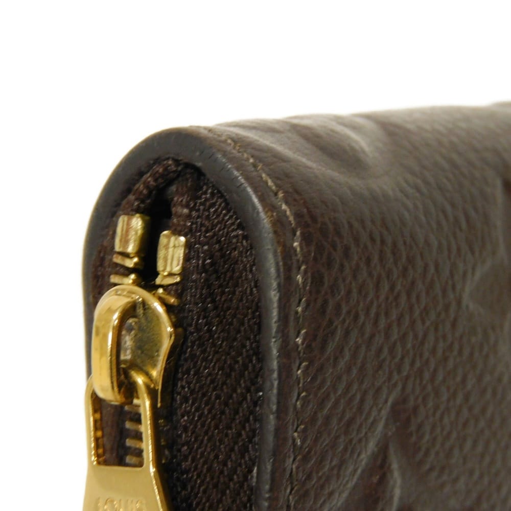 LOUIS VUITTON Coin case M60553 Implant leather (monogram embossed) Tail Monogram Unplant Zip around purse