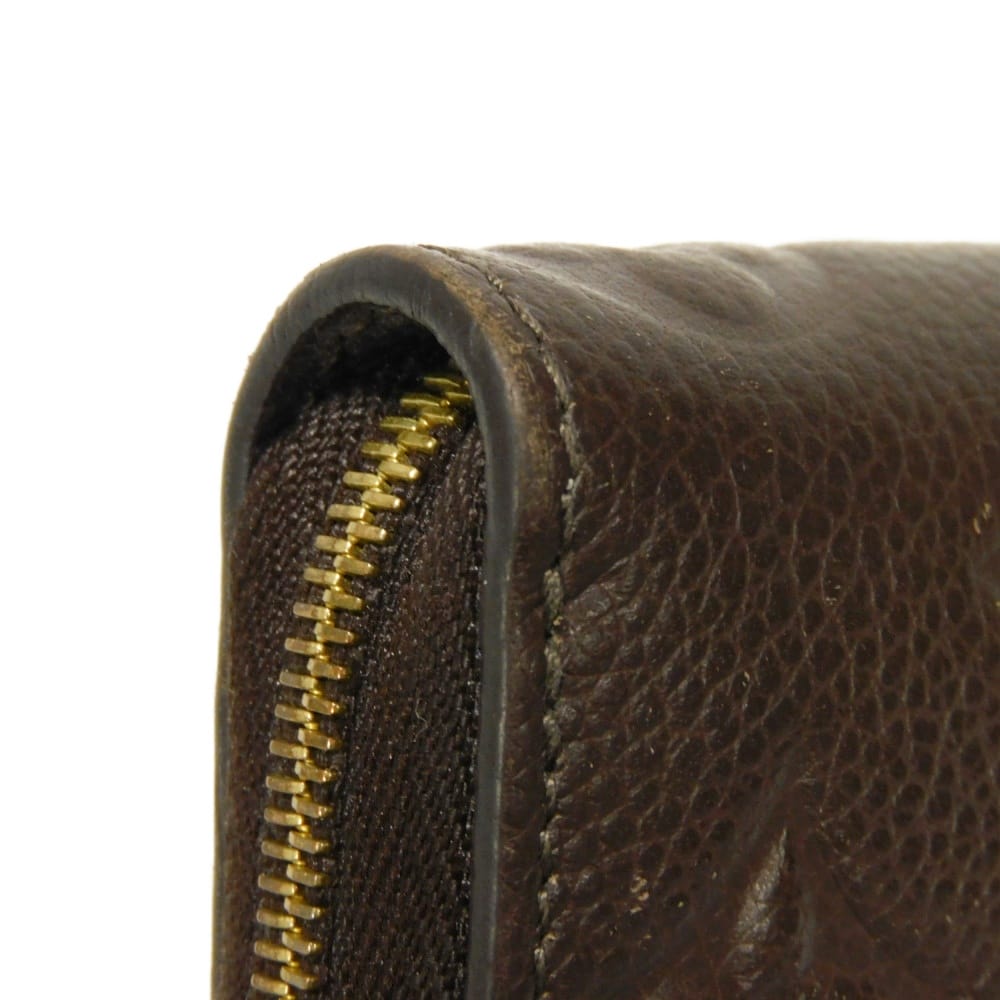 LOUIS VUITTON Coin case M60553 Implant leather (monogram embossed) Tail Monogram Unplant Zip around purse