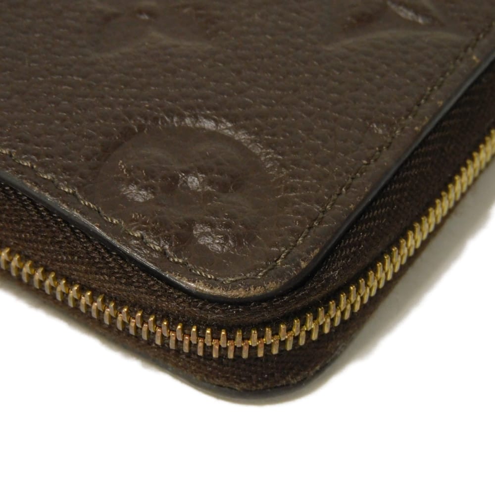 LOUIS VUITTON Coin case M60553 Implant leather (monogram embossed) Tail Monogram Unplant Zip around purse