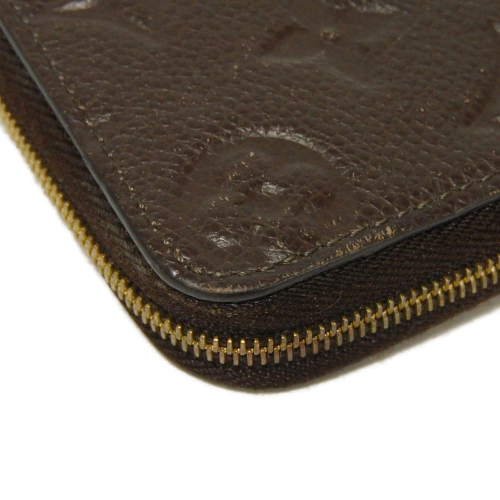 LOUIS VUITTON Coin case M60553 Implant leather (monogram embossed) Tail Monogram Unplant Zip around purse
