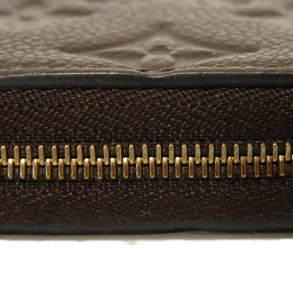 LOUIS VUITTON Coin case M60553 Implant leather (monogram embossed) Tail Monogram Unplant Zip around purse