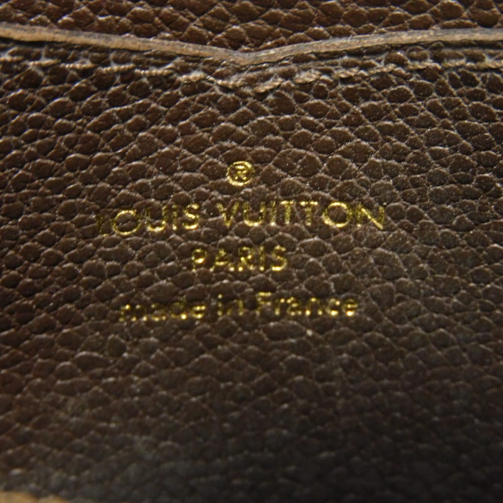 LOUIS VUITTON Coin case M60553 Implant leather (monogram embossed) Tail Monogram Unplant Zip around purse