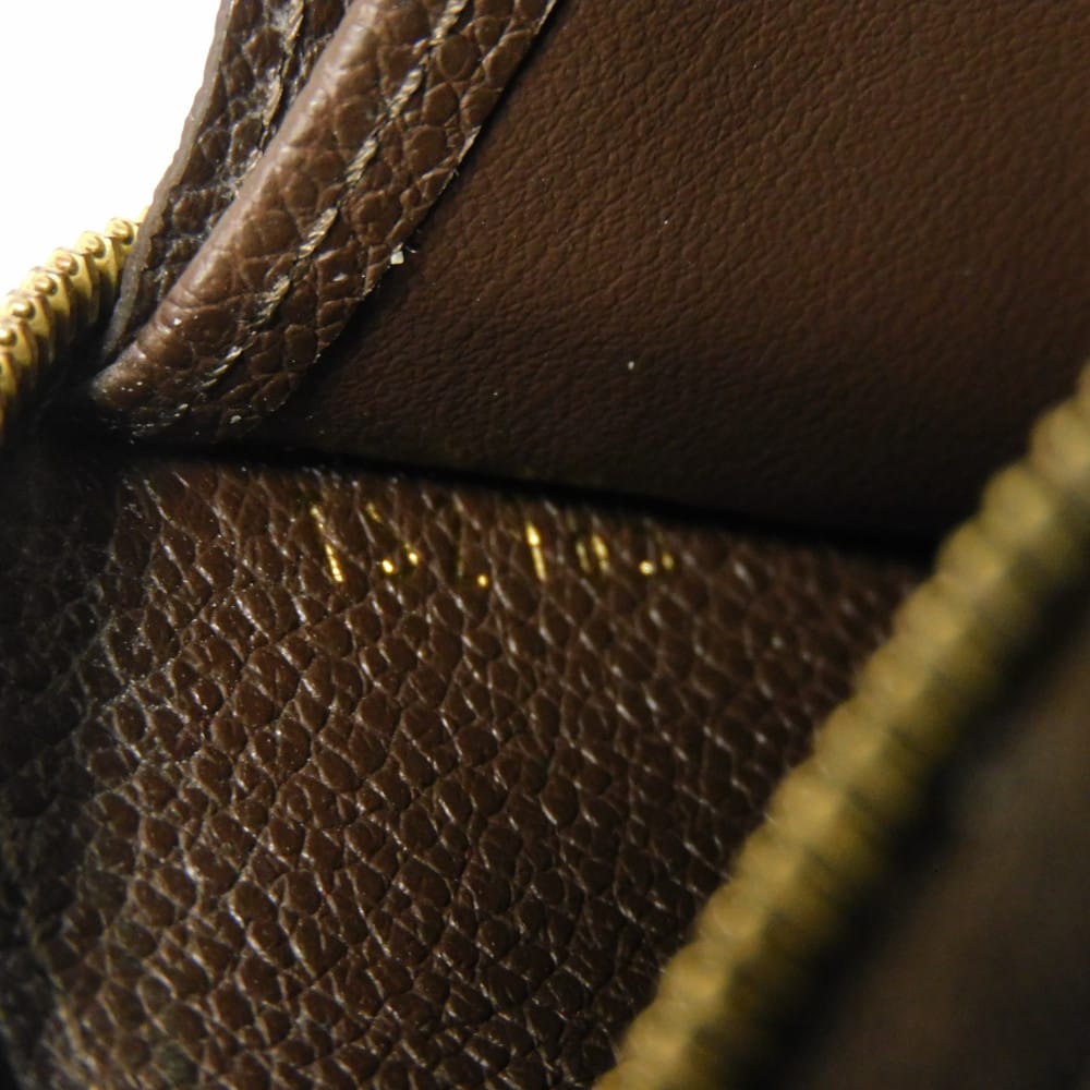 LOUIS VUITTON Coin case M60553 Implant leather (monogram embossed) Tail Monogram Unplant Zip around purse