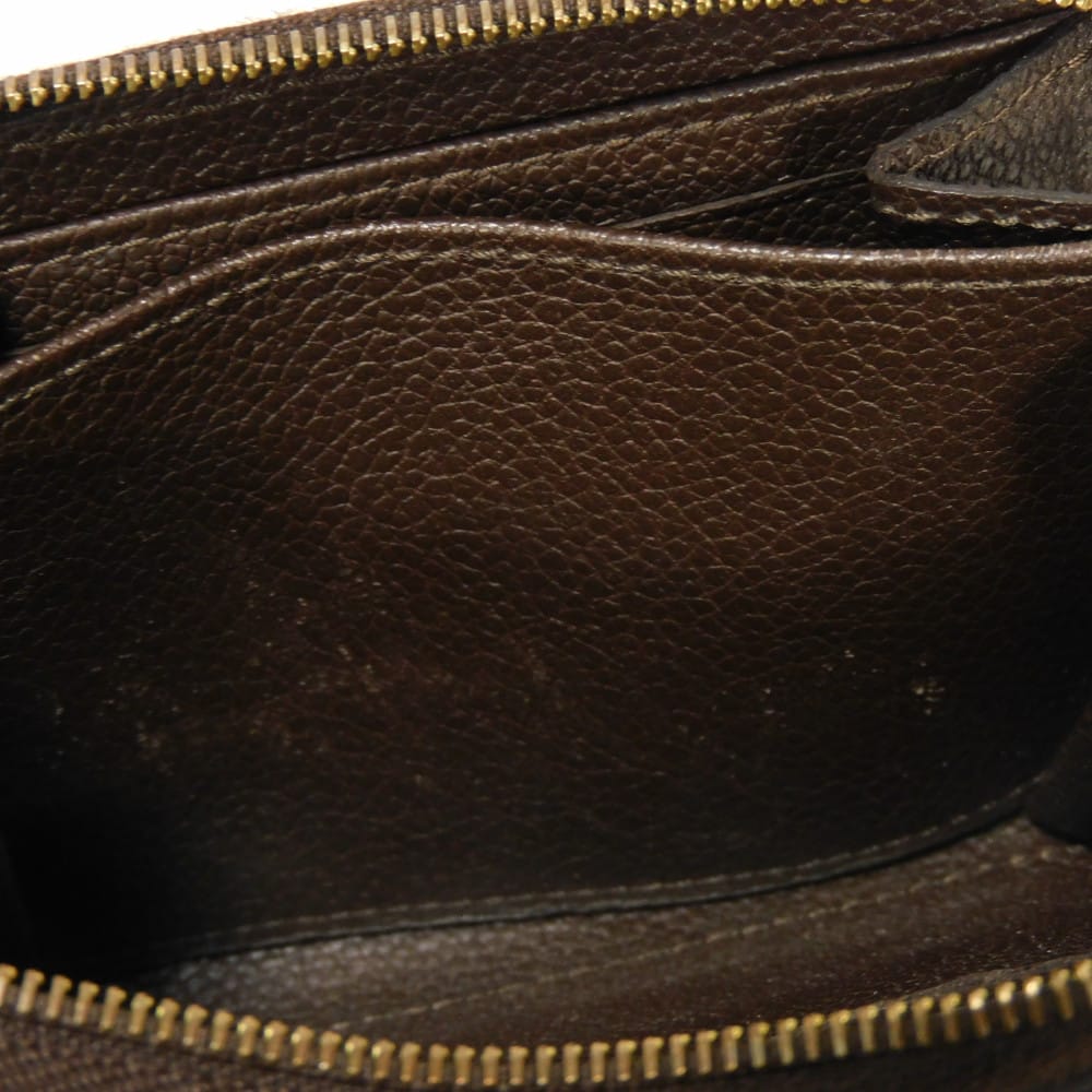 LOUIS VUITTON Coin case M60553 Implant leather (monogram embossed) Tail Monogram Unplant Zip around purse