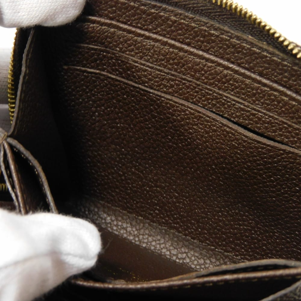 LOUIS VUITTON Coin case M60553 Implant leather (monogram embossed) Tail Monogram Unplant Zip around purse