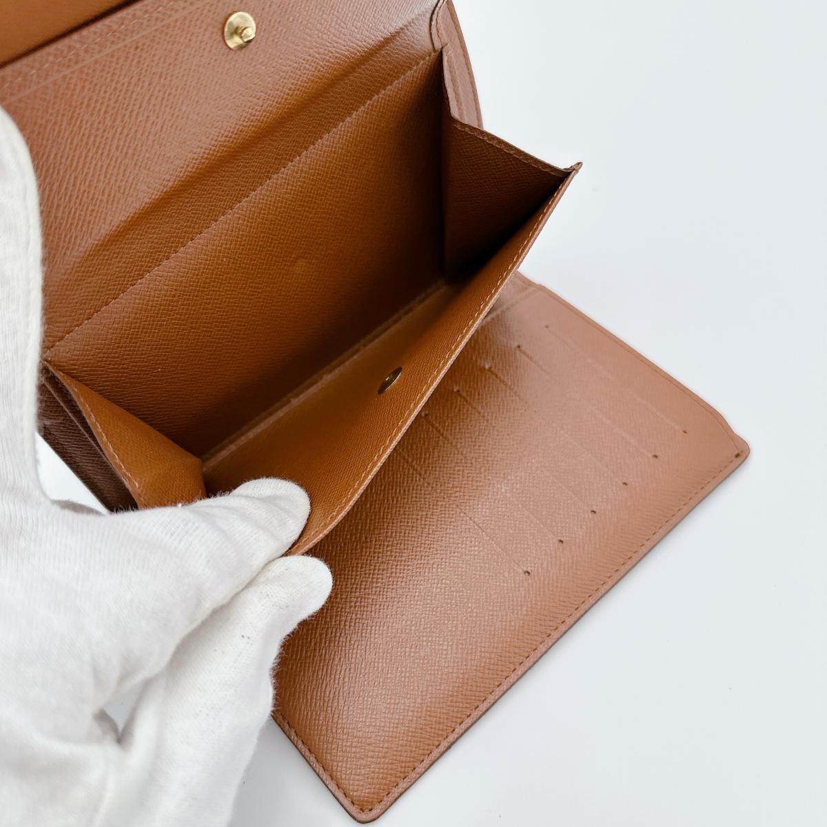 LOUIS VUITTON Tri-fold wallet M61202 Monogram canvas Brown Tri-fold wallet Monogram Porto Tresor Etuis unisex(Unisex) Used Authentic
