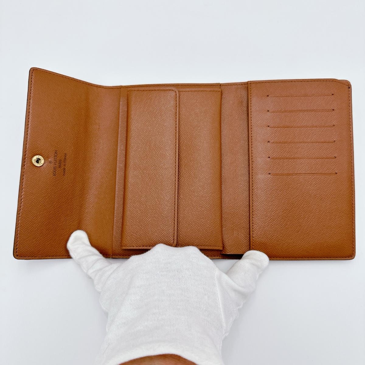 LOUIS VUITTON Tri-fold wallet M61202 Monogram canvas Brown Tri-fold wallet Monogram Porto Tresor Etuis unisex(Unisex) Used Authentic