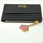 PRADA Coin case Safiano leather black logo robot charm