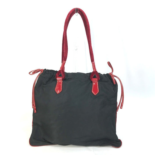 PRADA Handbag Patent leather, nylon, velour black By color logo drawstring bag triangle logo triangular logo plate