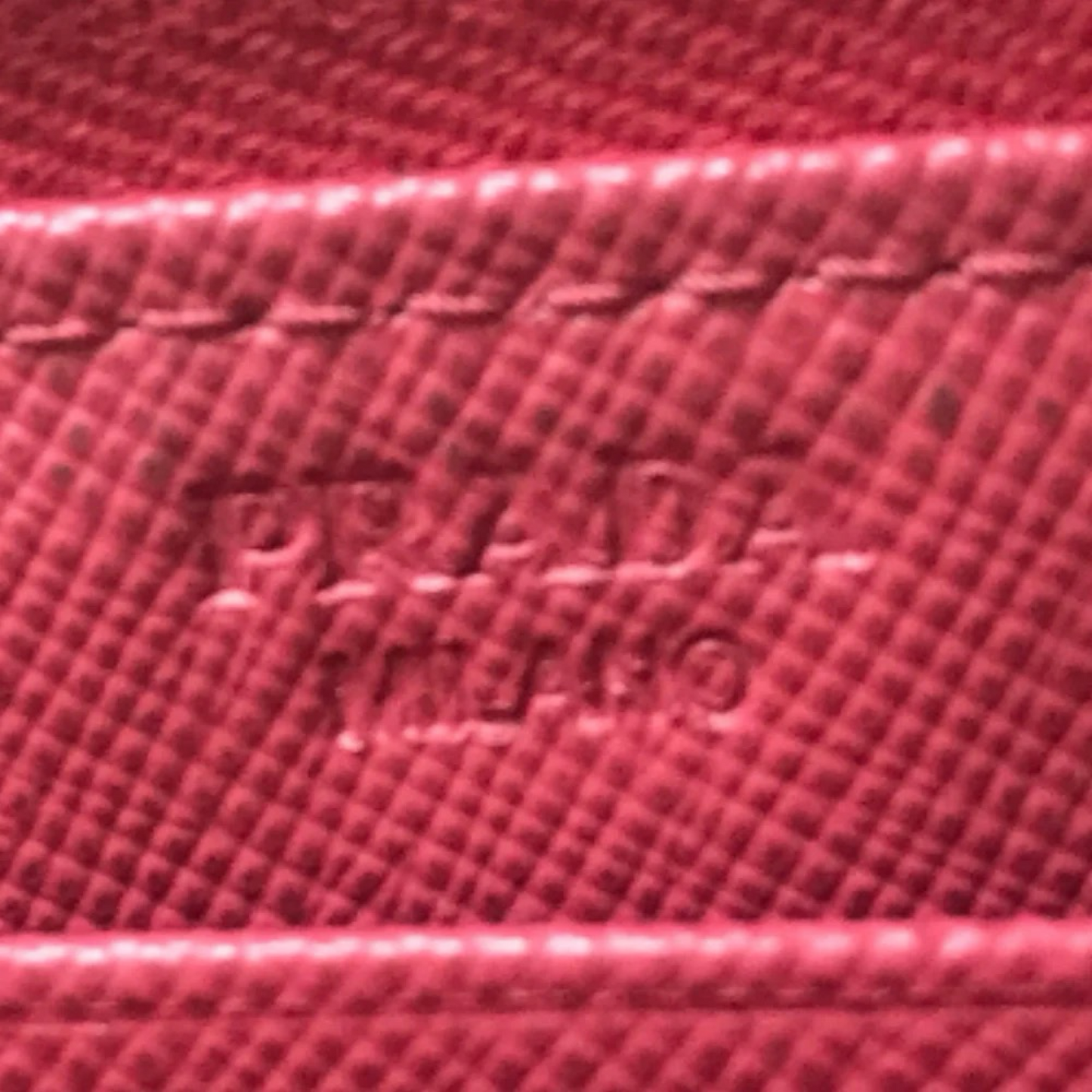 PRADA SAFFIANO ROUND ZIP WALLET