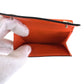 LOUIS VUITTON Tri-fold wallet M69245 leather Volcano orange Folding wallet Compact wallet Taiga Lama Monogram Discovery compact wallet Women Used Authentic