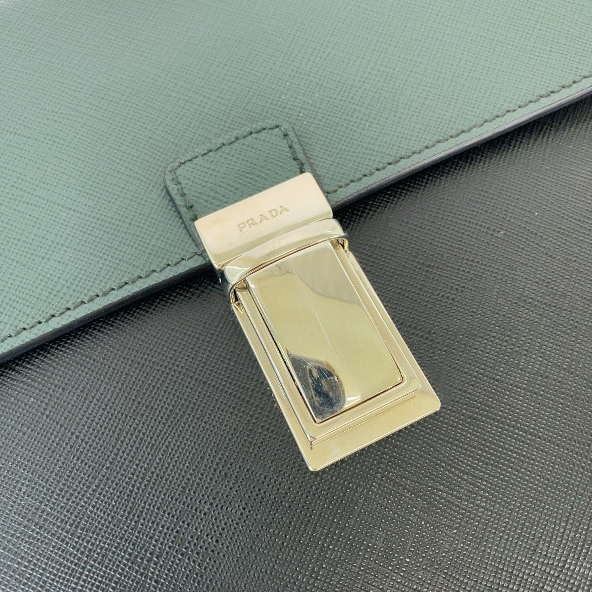 PRADA Clutch bag VR089M leather Bicolor Green Black Clutch bag Business bag Document case Safiano Triangle With logo mens Used Authentic