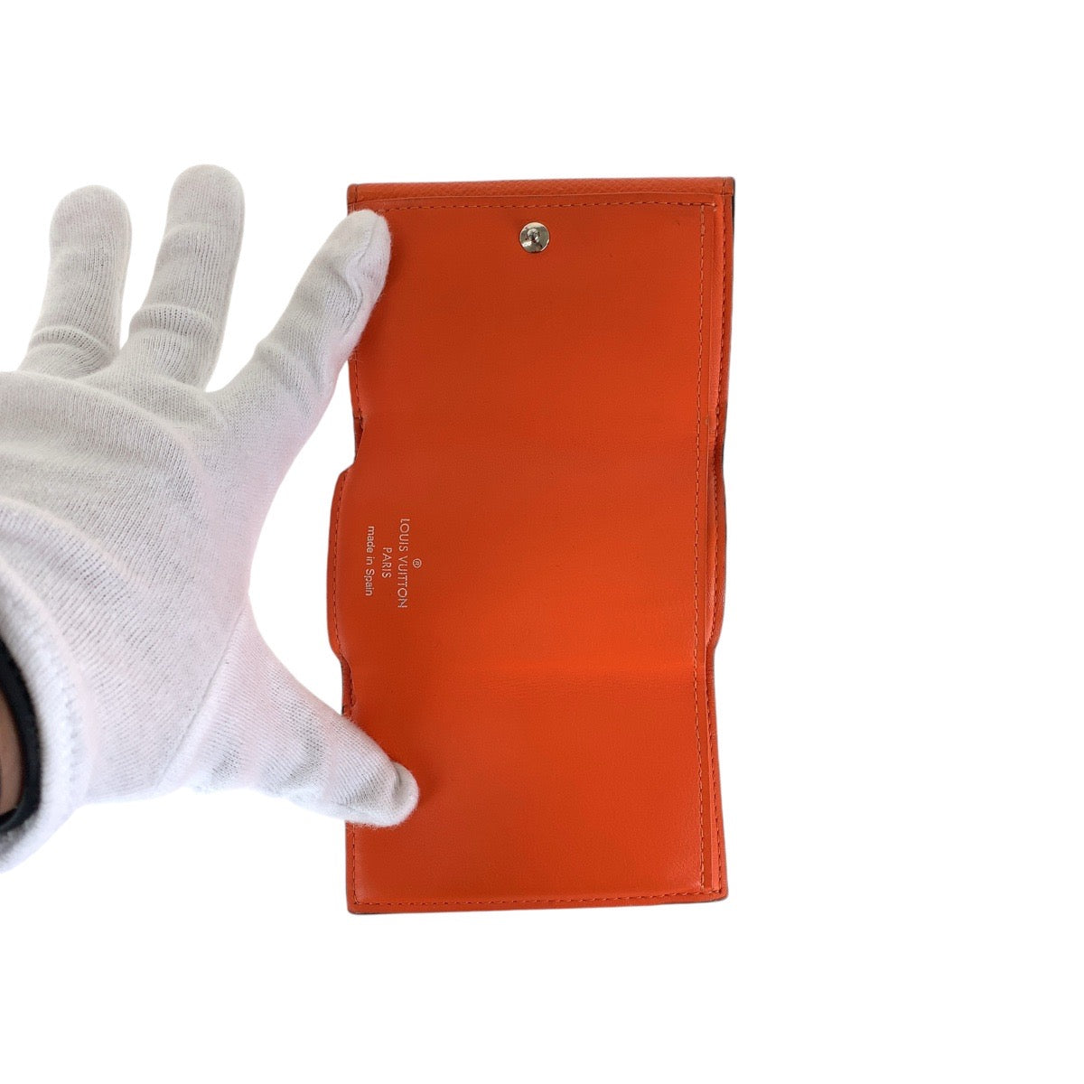 LOUIS VUITTON Tri-fold wallet M69245 leather Volcano Orange SilverMetal Taiga Lama Monogram Discovery compact wallet