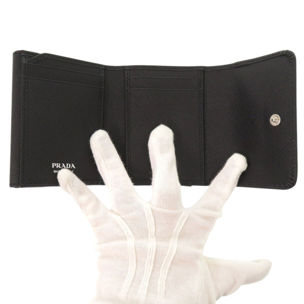 PRADA Tri-fold wallet 1MH043 leather black saffiano triangle