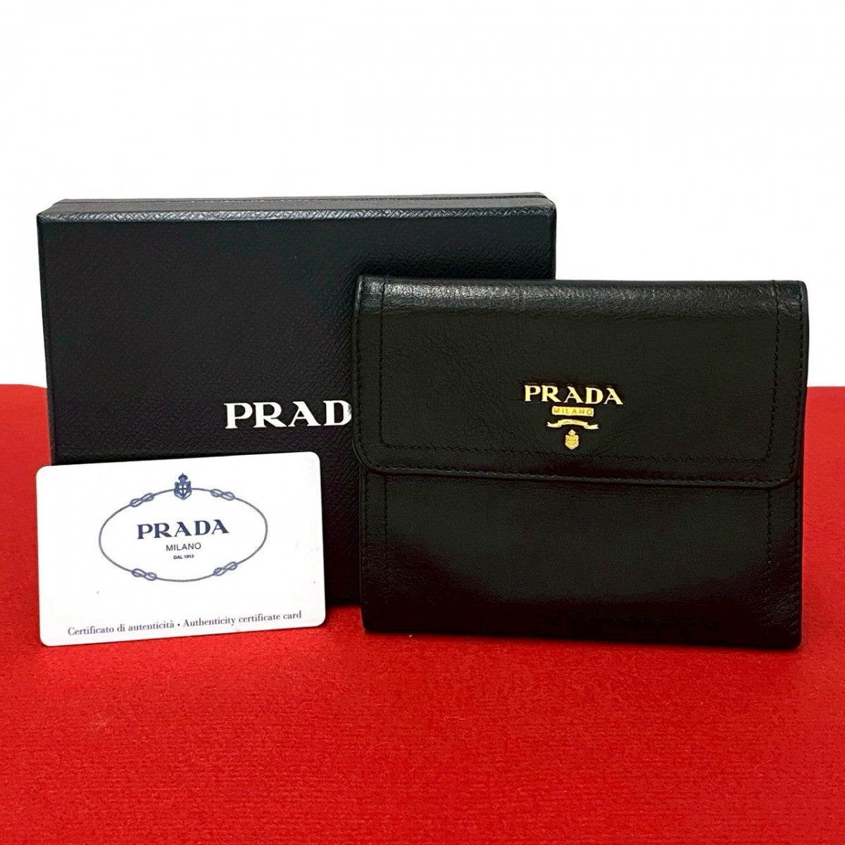PRADA Tri-fold wallet leather black PRADA logo Metal mens Used Authentic