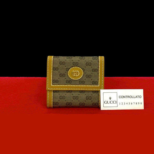GUCCI Coin case leather Brown