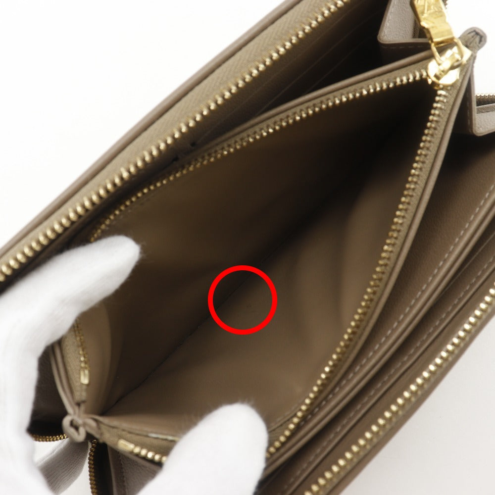 LOUIS VUITTON Long Wallet Purse M81511 lambskin beige Monogram Coussin Zippy wallet