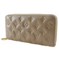 LOUIS VUITTON Long Wallet Purse M81511 lambskin beige Monogram Coussin Zippy wallet