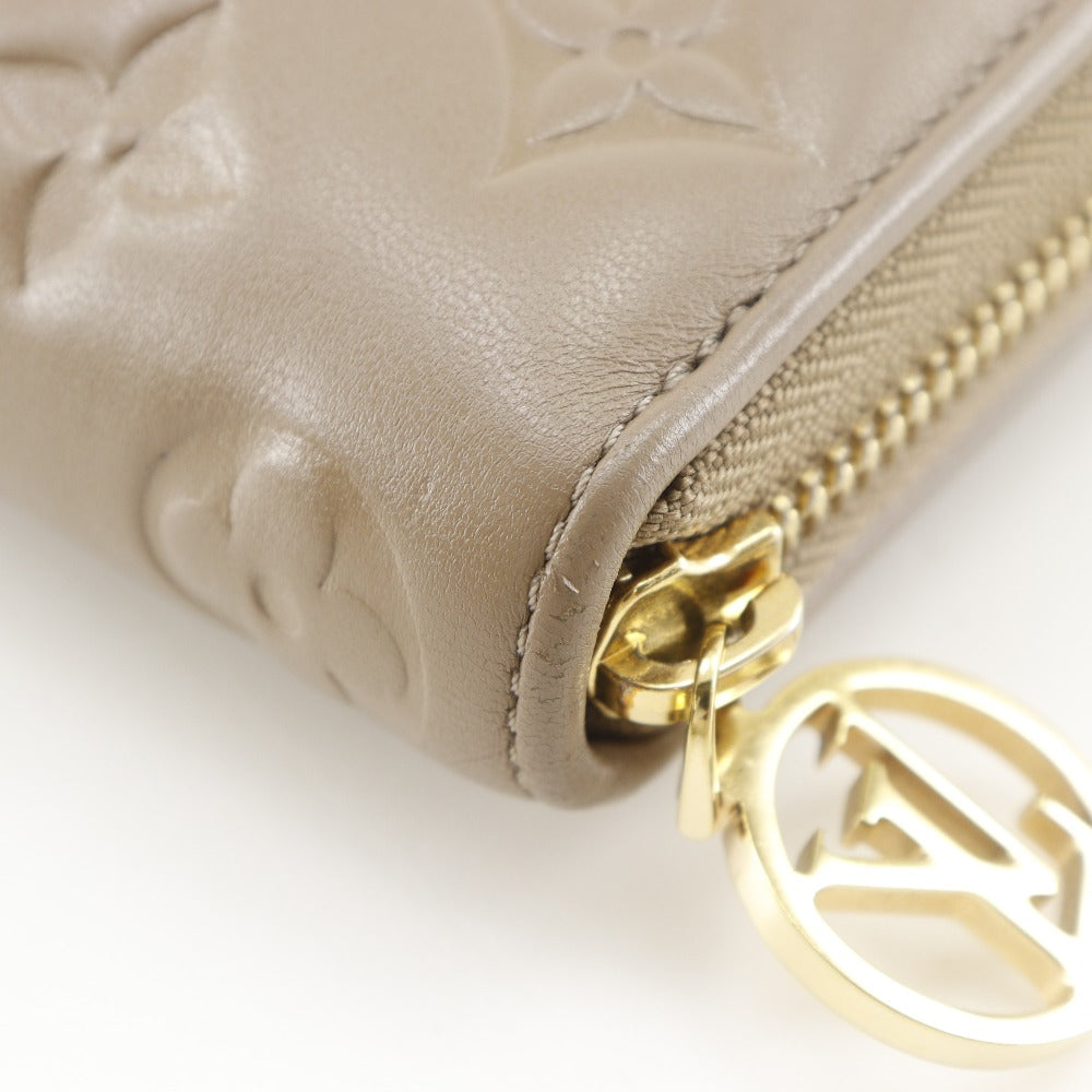 LOUIS VUITTON Long Wallet Purse M81511 lambskin beige Monogram Coussin Zippy wallet