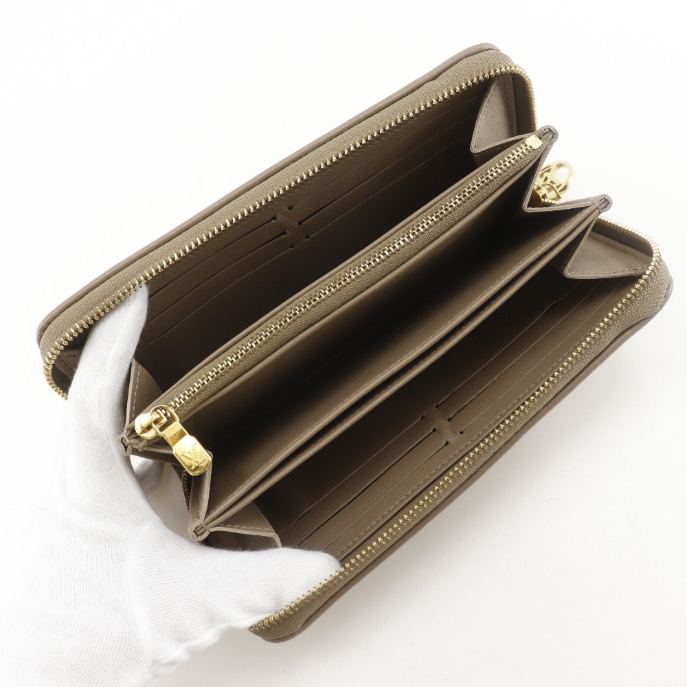 LOUIS VUITTON Long Wallet Purse M81511 lambskin beige Monogram Coussin Zippy wallet