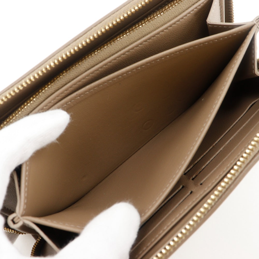 LOUIS VUITTON Long Wallet Purse M81511 lambskin beige Monogram Coussin Zippy wallet