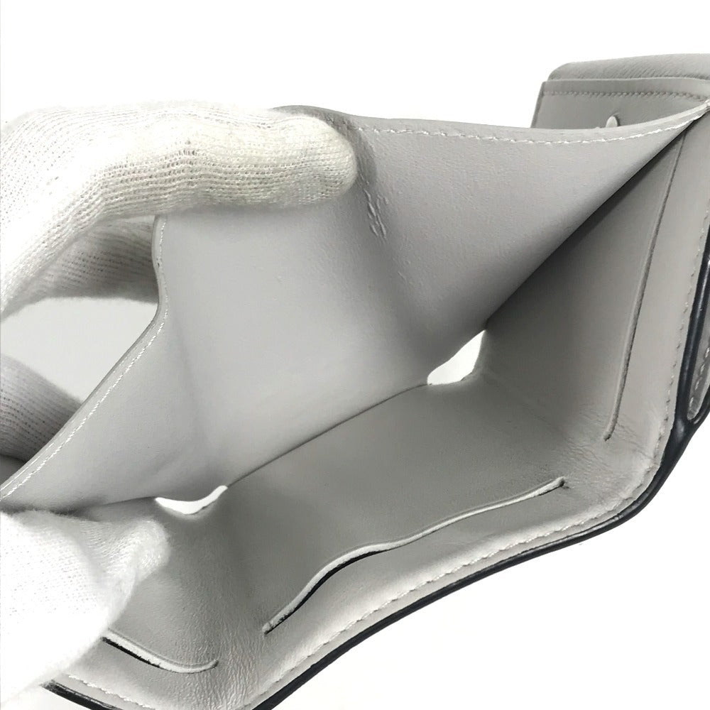 LOUIS VUITTON Trifold wallet M67621 Taiga Leather, Monogram Canvas white Taigalama Discovery compact wallet