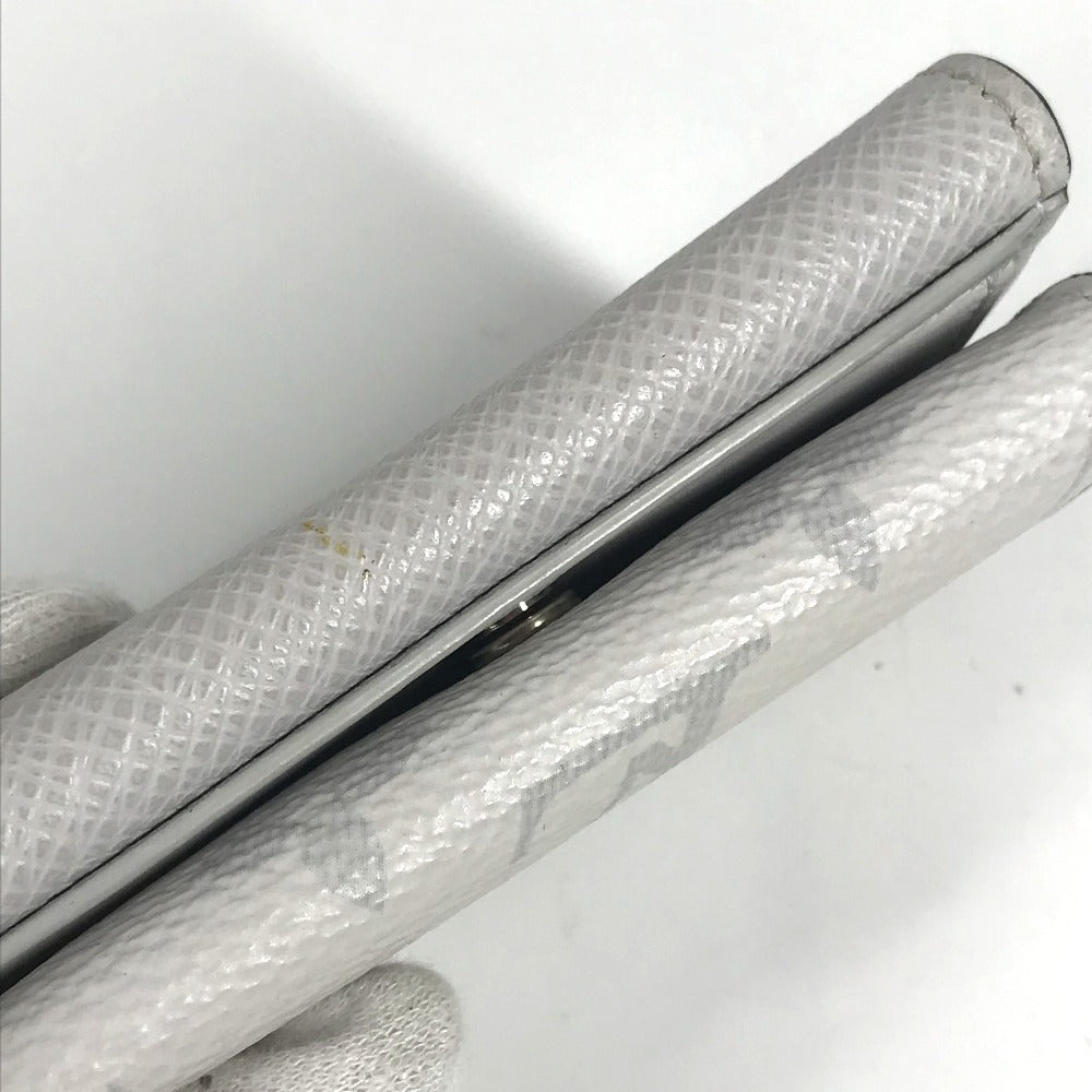 LOUIS VUITTON Trifold wallet M67621 Taiga Leather, Monogram Canvas white Taigalama Discovery compact wallet