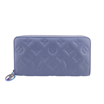 LOUIS VUITTON Long Wallet Purse M83682 leather blue Zip Around Monogram embossed Coussin Zippy wallet Women Used Authentic