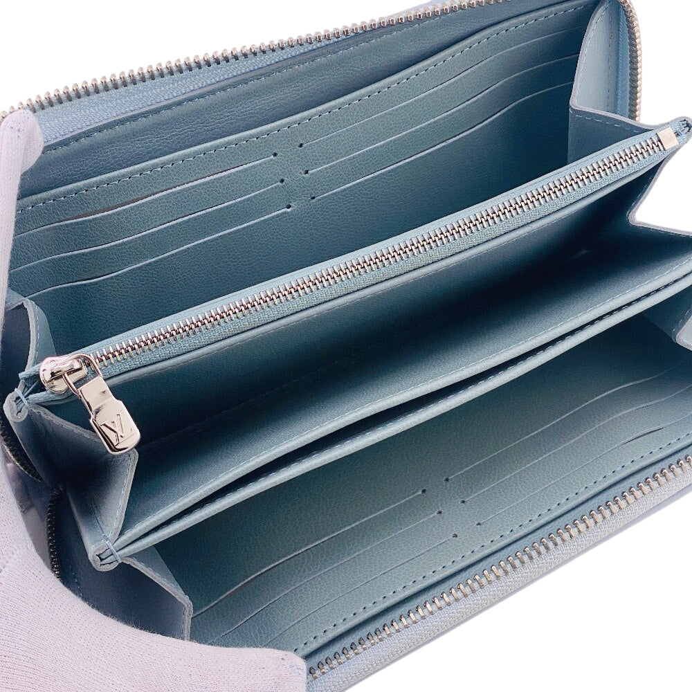 LOUIS VUITTON Long Wallet Purse M83682 leather blue Zip Around Monogram embossed Coussin Zippy wallet Women Used Authentic